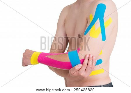 Kinesiology Taping On Human Hand, Isolated On White Background
