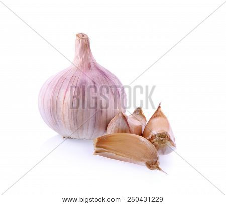 Garlic, Allium Sativum, Alliaceae On White Background.