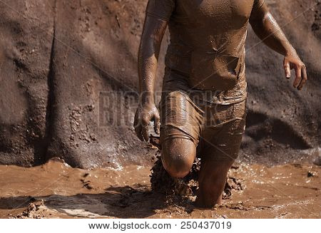 Mud Race Runners During Extreme Obstacle Races