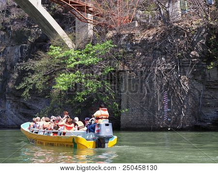 Tuxtla, Mexico North America On February 2018: Yellow Motor Boat With Tourists Under Bridge On Grija