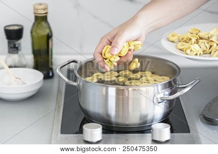 Cooking Fresh Ravioli, Fresh Pasta Italian Homemade. Boil In The Boiling Water. Family Favorite Menu