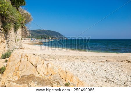 Sandy Beach And Sea