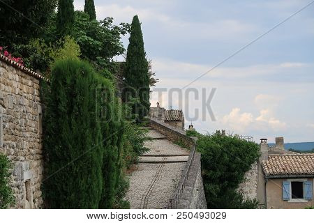 Grignan, France - July 16, 2018: Photography Showing Some Street And Buildings. The Photography Was 