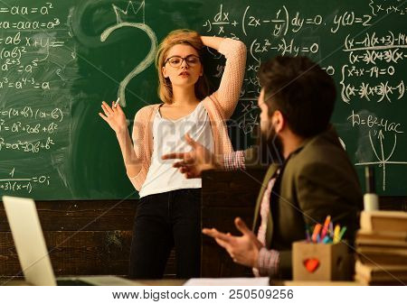 E-learning Education And University Concept, Tutor Asks The Tutee To Find The Definition In The Text