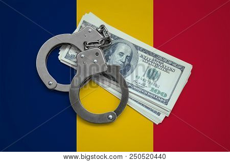 Chad Flag  With Handcuffs And A Bundle Of Dollars. Currency Corruption In The Country. Financial Cri
