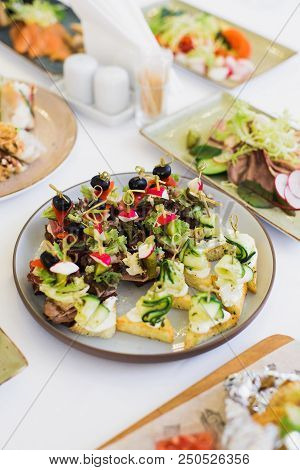 Spring Rolls In Rice Paper On Festive Table, Stock Photo Image
