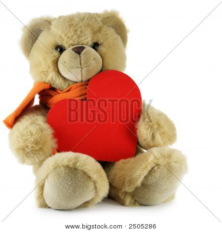 Ours en peluche avec grand coeur rouge