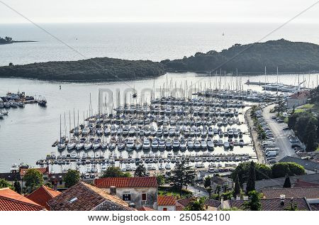 Vrsar, Croatia - May 22, 2018: Top View On Yacht, Port, Adriatic Sea And Small Croatian Town Vrsar.