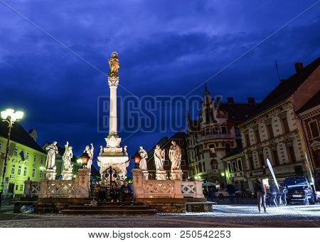 Maribor, Slovenia - May 22, 2018: Night View On Main Square Building And Plague Column In Maribor Ci