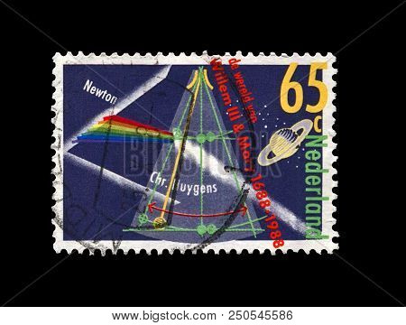 Netherlands - Circa 1988: Post Stamp Printed In Netherlands Shows Prism Splitting Light As Discovere