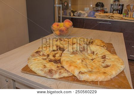 An Georgian Deli Classic Traditional Flatbread. Closed Pie With Beans (lobiani). Food Background