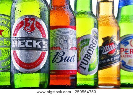 Poznan, Pol - July 19, 2018: Bottles Of Famous Global Beer Brands Including Heineken, Bud, Miller, T