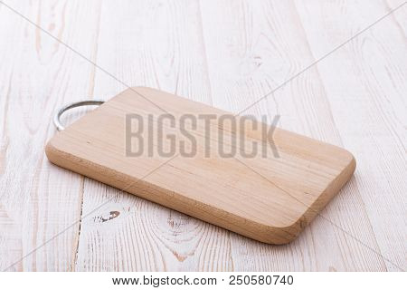 Cutting Board Top View On Wooden Background