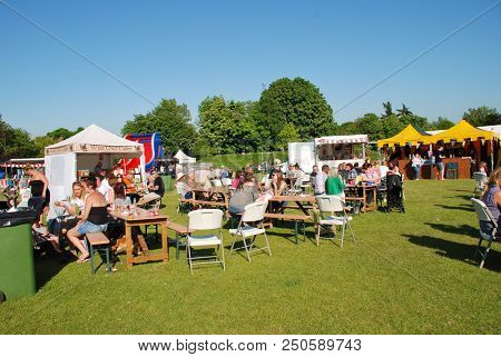 TENTERDEN, ENGLAND - MAY 20, 2018: People enjoy the annual Food and Drink Festival at Tenterden in Kent. The event was first held in 2017.