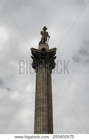 Adiral Nelson Monument And Dark Sky In London