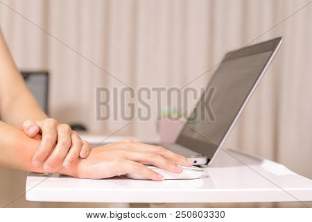 Woman Wrist Hand Arm Pain Long Use Mouse Working. Office Syndrome Healthcare And Medicine Concept