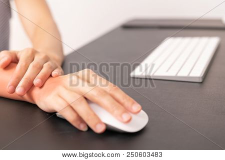 Woman Wrist Hand Arm Pain Long Use Mouse Working. Office Syndrome Healthcare And Medicine Concept