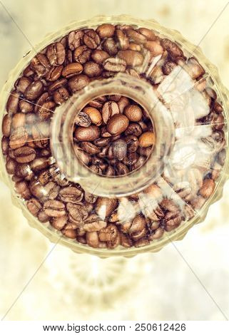 Coffee Beans In A Glass Container Top View Selective Focus