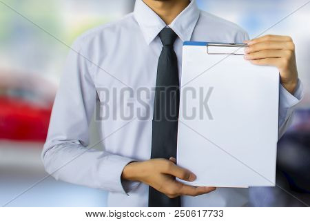 This Career Man Saleman Business Inspection Writing Note On Notepad Or
Book, Paper With Showroom  Bl