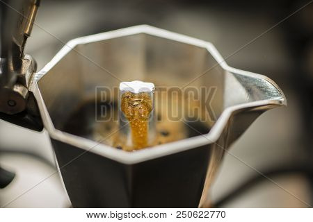 Traditional Italian Moka Machine With Fresh Hot Coffee Coming Up.