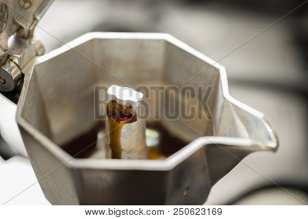 Traditional Italian Moka Machine With Fresh Hot Coffee Coming Up.