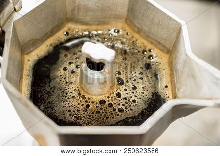 Traditional Italian Moka Machine With Fresh Hot Coffee Coming Up.