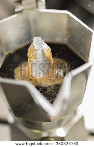 Traditional Italian Moka Machine With Fresh Hot Coffee Coming Up.