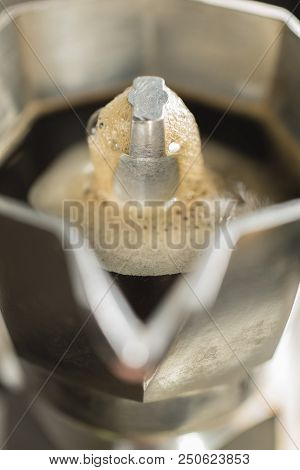 Traditional Italian Moka Machine With Fresh Hot Coffee Coming Up.