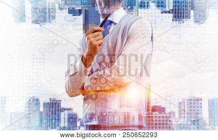 Confident And Young Businessman In Smart-casual Wear Smoking Pipe And Modern Cityscape With Business