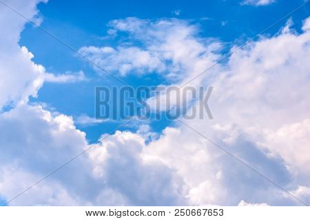 Blue Sky And Big White Clouds Background.