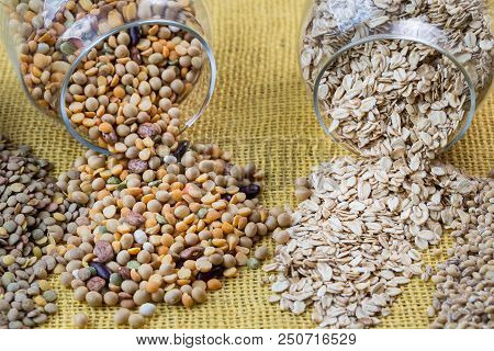 Glass Jars With Various Legumes - Beans, Oatmeal Flakes, Peas And Lentils. Cooking, Diet, Vegan And 