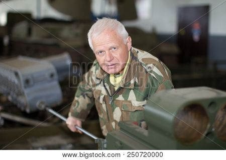 Belarus, Gimel, April 27, 2018. Military Factory.military Worker Repairing Tanks