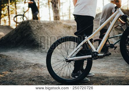 A Platform For Extreme Cycling Jumping At Sunset. Dert In The Forest. Sports Equipment For Jumping O