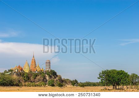 Big Buddha Temple, Wat Tham Suea, On Mountain Behind Dry Rice Field Kanchanaburi Thailand