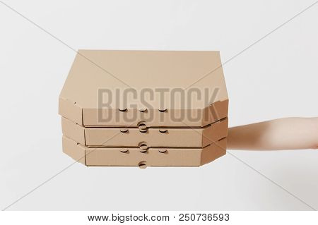 Close Up Female Holds In Hand Stack Pizza In Clear Empty Blank Cardboard Brown Flatboxes, Food Order
