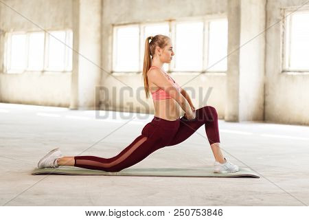 Female In Trendy Sports Clothes Training In Loft Interior Gym Training Lower Body And Legs, Sportswo