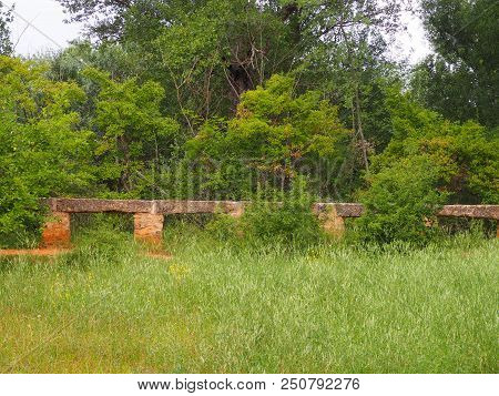 Rustrel, France - July 14, 2018: Photography Showing An Old Small Viaduct. The Photography Was Taken