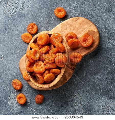 Dried Apricots On Gray Background. Top View.