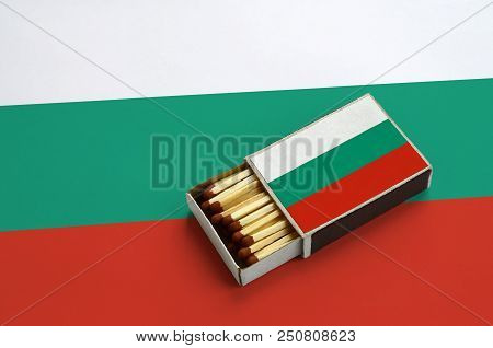 Bulgaria Flag  Is Shown In An Open Matchbox, Which Is Filled With Matches And Lies On A Large Flag.