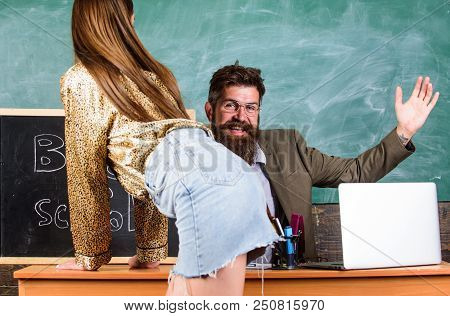 Teacher Or School Principal Punishes Slapping Buttocks Sexy Girl Student. Student In Mini Skirt With