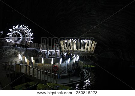 Turda, Romania - June 18: Tourists And Lights In Salina Turda, Turda Salt Mine, Near Cluj Napoca, Tr