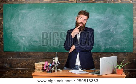 Teacher Interesting Interlocutor Best Friend. Teacher Charismatic Hipster Stand Near Table Classroom