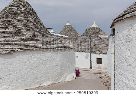 Unique Small South Italia City Alberobello With Antient Stones Conical Houses Trullo, Tourist Destin