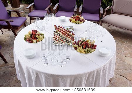 Round Table With Beautiful Snack. The Buffet Table With Beautiful Food