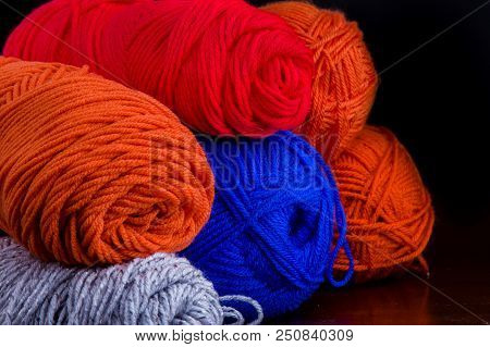Yarn That Is Sitting In Buddles Waiting For Someone To Use Them For Homemade Goods.