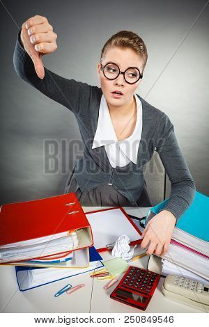 Dissatisfaction And Disappointment. Young Elegant Sad Woman In Business Elegant Clothes In Office Sh