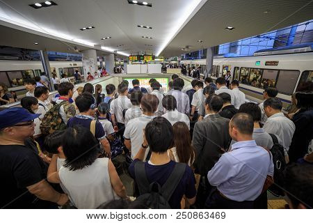 Osaka, Japan - July 24 2015: Crowd Of Men Exits The Platform At Jr Osaka Station