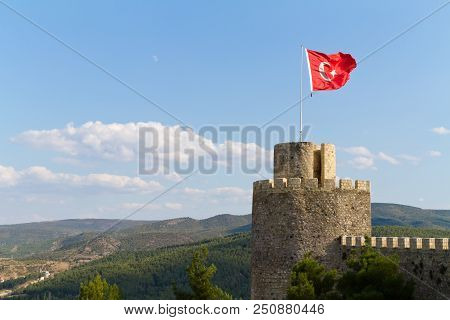 Turkish Flag Waving In The Wind At The Boyabat Castle Against Blue Sky, Turkey, Asia