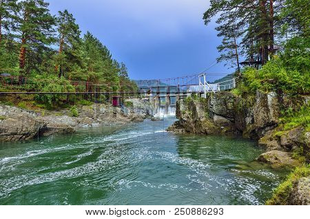Beautiful Summer Mountain Landscape On Chemal River, Altai Mountains, Russia Bridge Between Rocky Sh