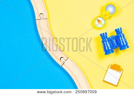 Kids Toys Background. Toy Tourist Equipment On Colorful Background